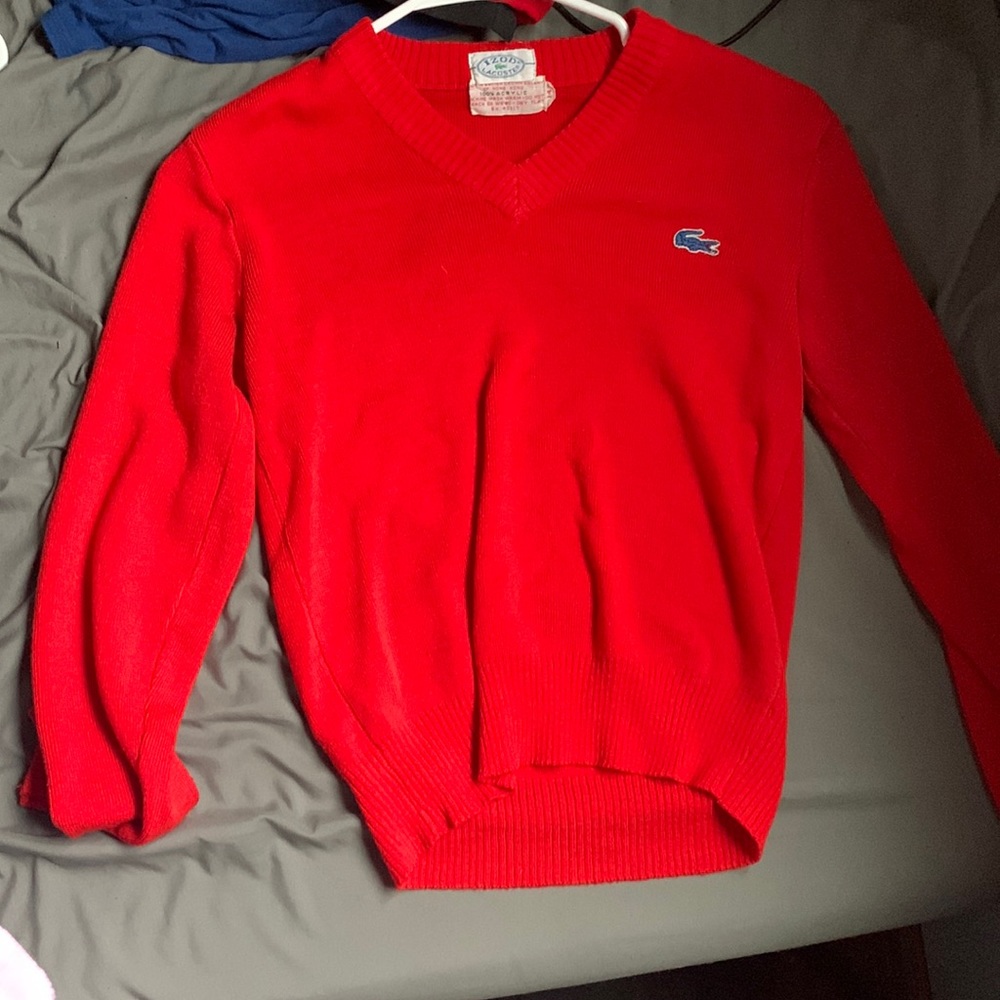 This is a really cute red sweater type shirt it’s my favorite but I can’t fit it